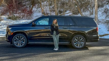 Allison Bell Standing With Her 2021 Cadillac Escalade
