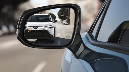 A Car Following Behind Another Car, Indicating Someone May Be Stalking Or Following The Lead Car With Bad Intentions