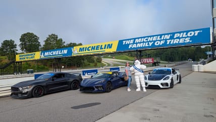 Me Standing Next To Bib The Michelin Tires Man In The Pit Lanes Of Michelin Roadway Atlanta