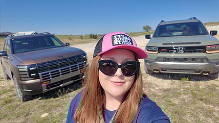 Natalie Standing With Two Finalists From The Texas Auto Writers Association'S Best Off Road Suvs Event