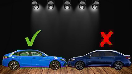 A Toyota Corolla Hybrid And The Honda Civic Hybrid On A Stage, Indicating A Contest Of Which Is Best