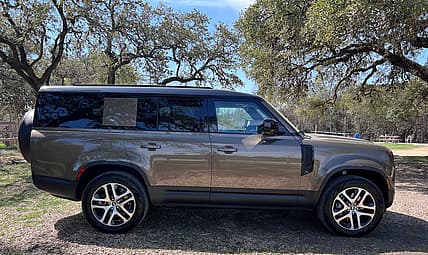 A Side View Of The Land Rover Defender 130