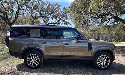 A Side View Of The Land Rover Defender 130