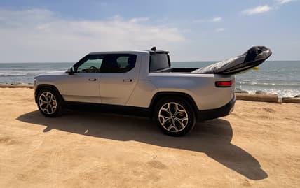 The Non-Polluting Rivian R1T Suits The Surfer'S Environmental Considerations And Is A Great Car For Traveling With Pets