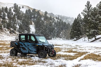 The 2025 Kawasaki Ridge Crew Atv In The Snow