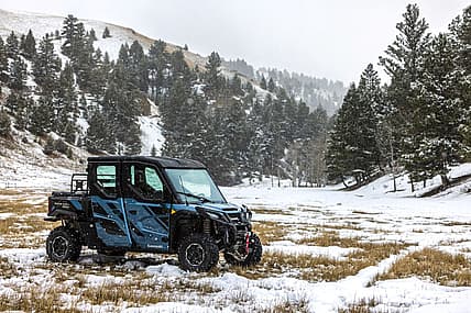 The 2025 Kawasaki Ridge Crew Atv In The Snow
