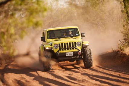 A Jeep Wrangler Is Used To Test Tire Effectiveness On Sand And Dirt