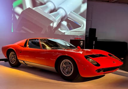 The Lamborghini Miura P400 Sv And On A Pedestal Behind It, The Brick Shop Version