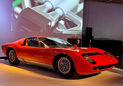 The Lamborghini Miura P400 Sv And On A Pedestal Behind It, The Brick Shop Version