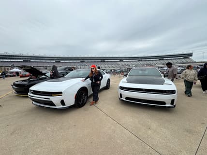 Natalie Standing With A Few Dodge Charger Sixpacks During Mopar Heaven