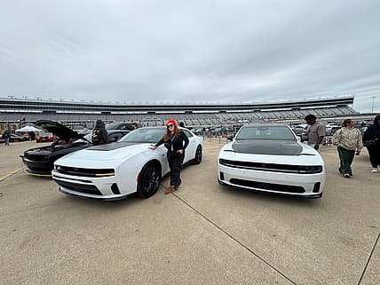 Celebrating 10 Years of Mopar Heaven and the Next Generation of Muscle at Texas Motor Speedway 1 Natalie Standing With A Few Dodge Charger Sixpacks During Mopar Heaven