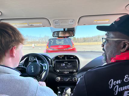 Student And Instructor In Kia Souls At B.r.a.k.e.s. Driving School