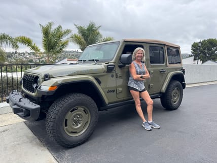 Kymri Wilt Standing With The 2025 Jeep Wrangler 4Xe Willys