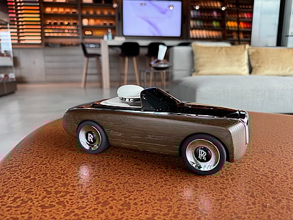 A Mini Rolls-Royce Model On Display At Rolls-Royce Private Office New York