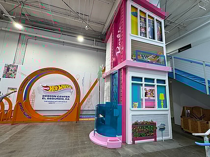 The Lobby In The Mattel Design Center Features A Super-Size Hot Wheels Track And An Elevator Bank Dressed Up As The Barbie Dream House