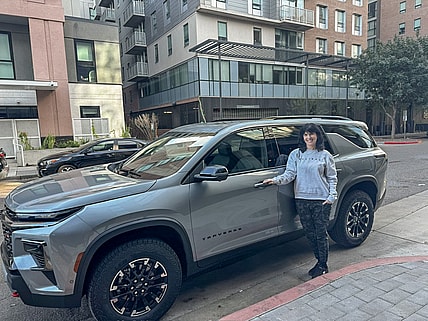 The 2026 Chevy Traverse Z71's Versatility Made My Sorority Mom Weekend Much More Fun 1 Jenn Mitchell Standing With The 2026 Chevy Traverse Zl1