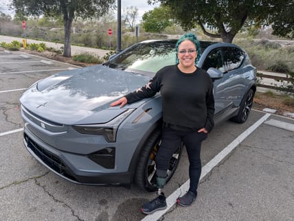 EV Innovation Meets Inclusivity: How the 2025 Polestar 3 Caters to All Drivers 2 Liv Leigh Standing Next To A Polestar 3
