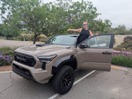 Liv Standing With The 2025 Toyota Tacoma Trailhunter Double Cab