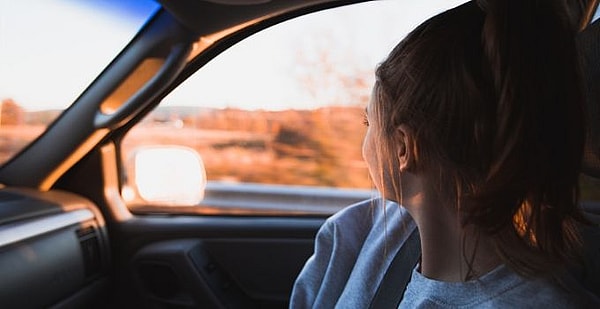 Woman Sitting In Car