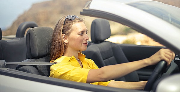Woman Driving In The Sunshine. Photo: Pexels