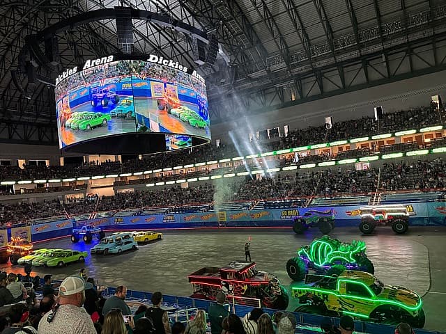 Hot Wheels Monster Trucks Live Glow Party Was the Boy-Mom Delight I Didn't Know I Needed 3 Monster Trucks Getting Ready To Start The Show At The Dickies Arena In Fort Worth, Texas