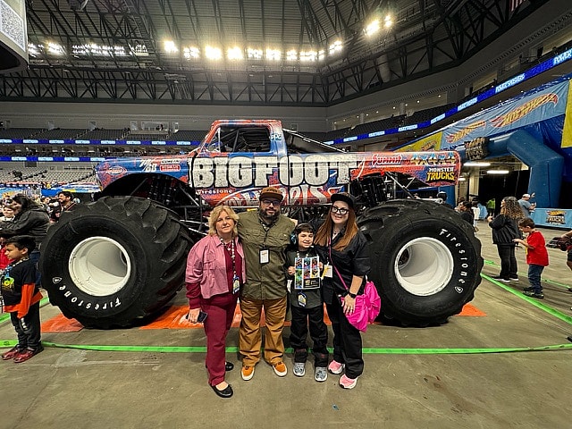 A Happy Family At The Hot Wheels Monster Trucks Live Glow Party In Fort Worth, Texas