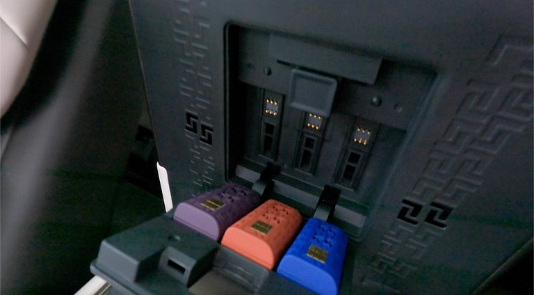 The Fragrance Diffuser Under The Center Armrest