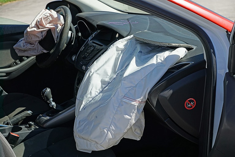 Airbags Are One Of The Key Car Safety Features. Deployed Airbags In A Car Accident 