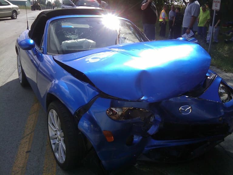 13 Things to Know—and Do—After a Car Accident 10 What To Do After A Car Accident-Stay At The Scene.