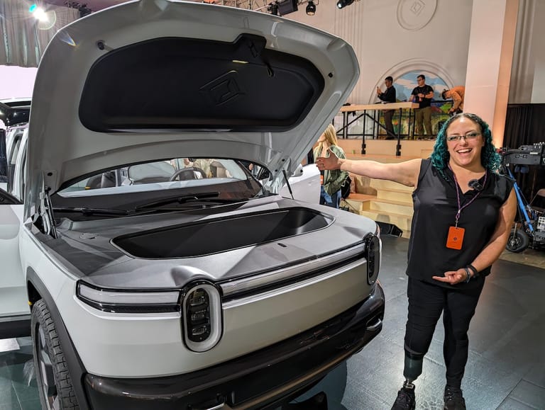 10 Reasons the 2027 Rivian R2 Electric SUV Is Worth Waiting For 12 Me With The R2'S Frunk