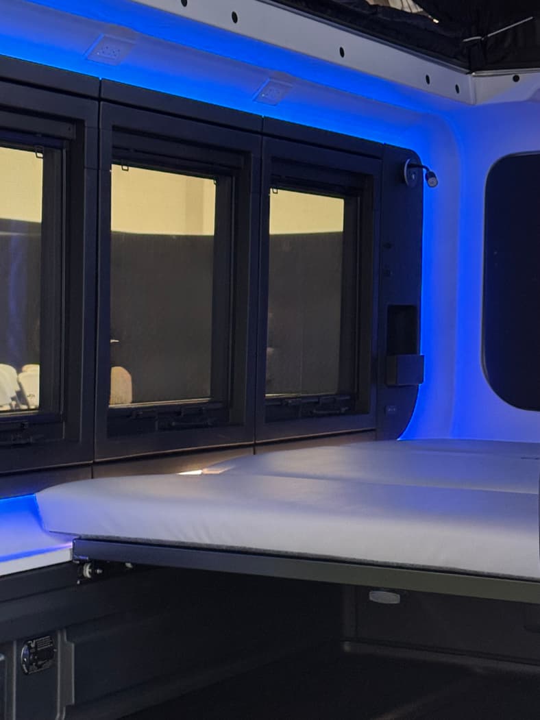 The Interior Of The Honda Base Station Converts To A Queen Bed