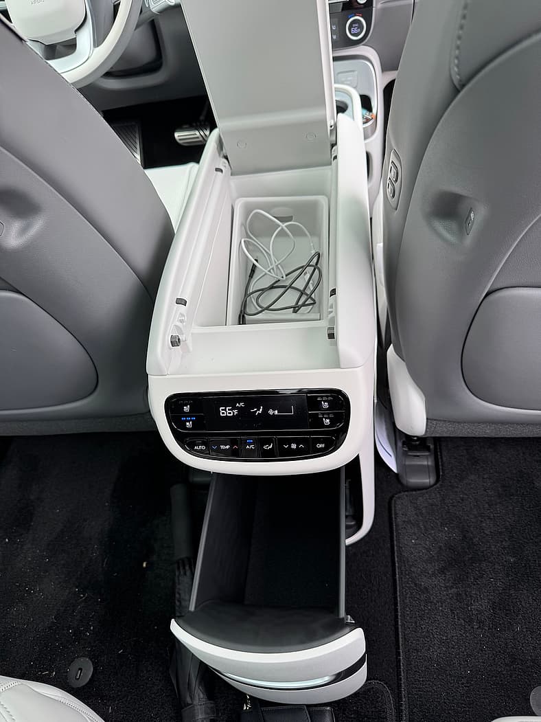 The Sliding Center Console Offers Rear Seat Passengers Lots Of Storage Space