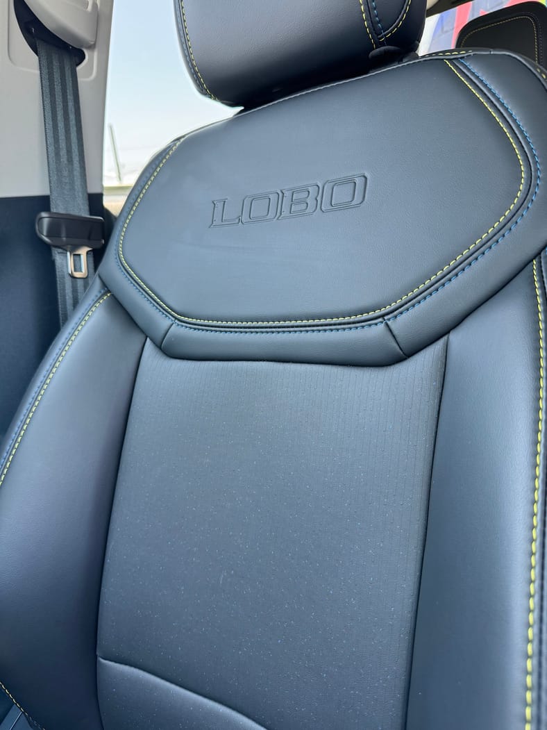 The Ford Maverick Lobo Seats Are Embossed With The Name And Contrast Stitched In Blue And Yellow