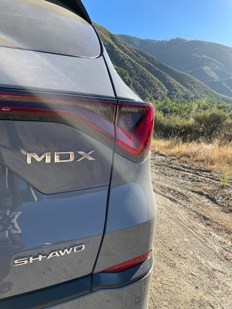 2025 Acura MDX First Drive: A Glow-Up Makes This Sporty SUV Even More Fun and Beautiful 10 The Mdx Badge On The 2025 Acura Mdx