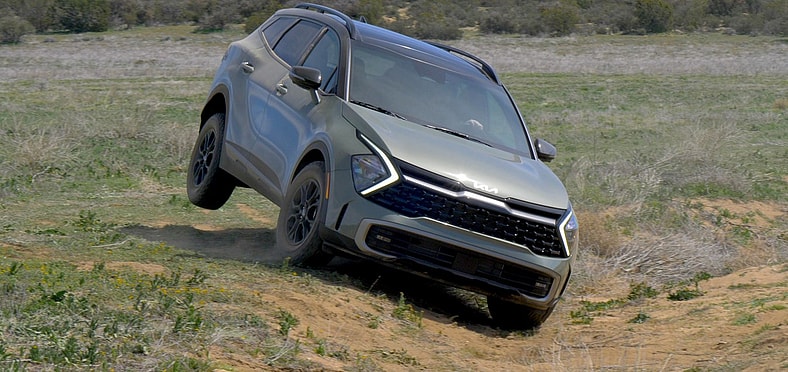 These Are Our Favorite New Car Deals—to Buy or Lease—This Labor Day 5 The 2025 Kia Sportage X-Pro Going Off-Road