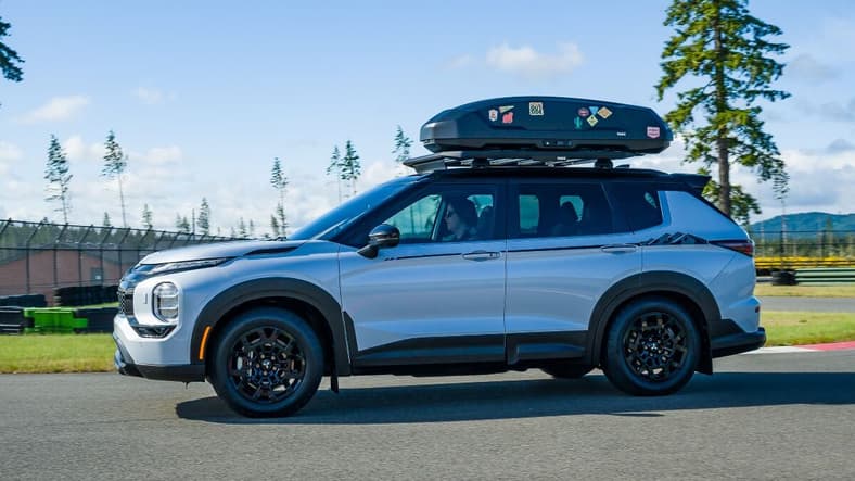 Shopping For a Subaru Outback? Here Are 8 SUVs We Think You Should Consider First 10 A Side View Of The 2025 Mitsubishi Outlander Trail Edition