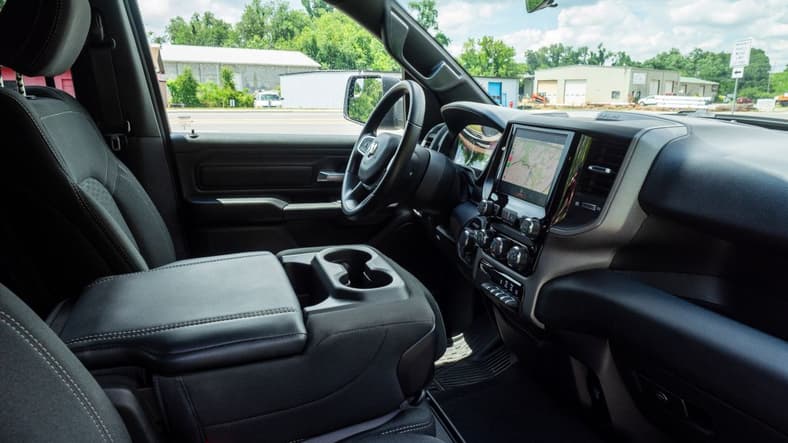 The Interior Of The 2025 Ram 1500 Warlock Facing The Driver'S Door From The Passenger'S Side