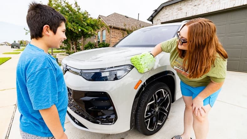 Having Fun While Washing A Car With My Son