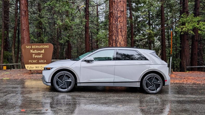 The 2025 Hyundai Ioniq 5 Xrt Parked At The Entrance Of A National Forest