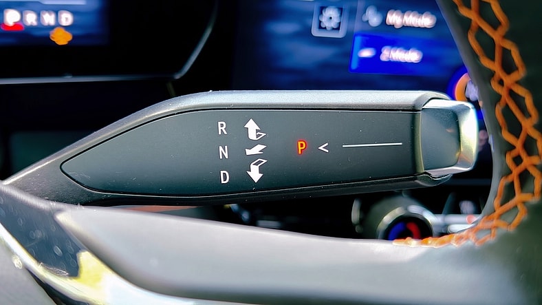 Chevy Blazer EV Super Sport: This Midsize EV Is Also a Muscle Car, So We Went For a Spin 3 Orange Stitching On The Steering Wheel Frames The Gear Shifter On The Chevy Blazer Ev Super Sport