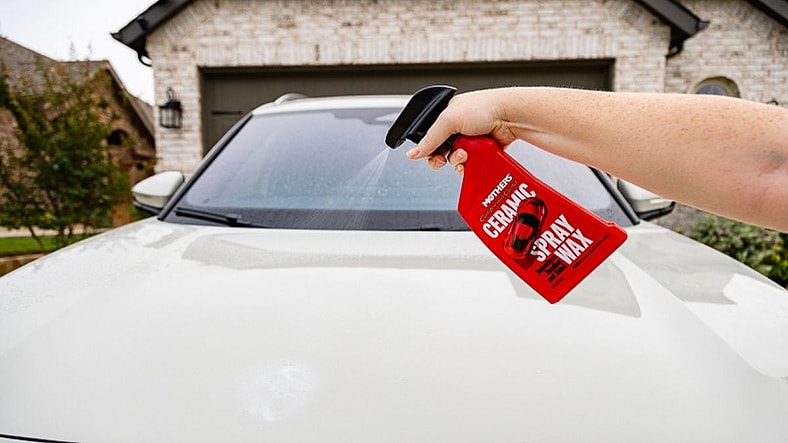 Spraying The Wax On The Hood Of Our Vw
