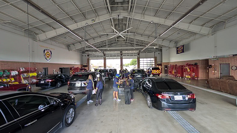 The Fire And Rescue Station Filled With Visitors, Hospital Staff, And Certified Technicians