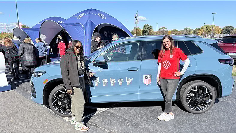 Kim S Standing With Artist Remy Glock