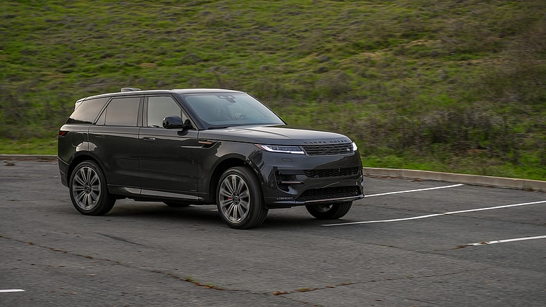 A Rolling Shot Of The 2025 Land Rover Range Rover Sport Autobiography Phev