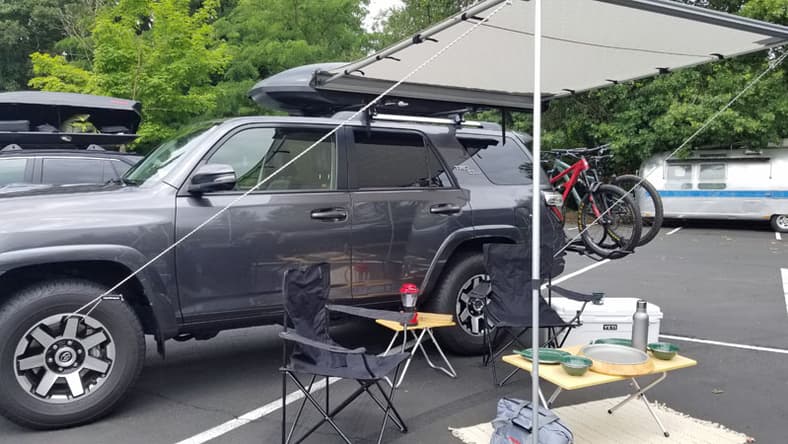 The Best Cars for Getting Off the Grid and Back to Nature 2 Yakima Rollout Awning Toyota Rav4 Small Suv