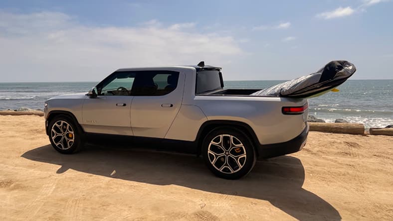 The Non-Polluting Rivian R1T Suits The Surfer'S Environmental Considerations And Is A Great Car For Traveling With Pets