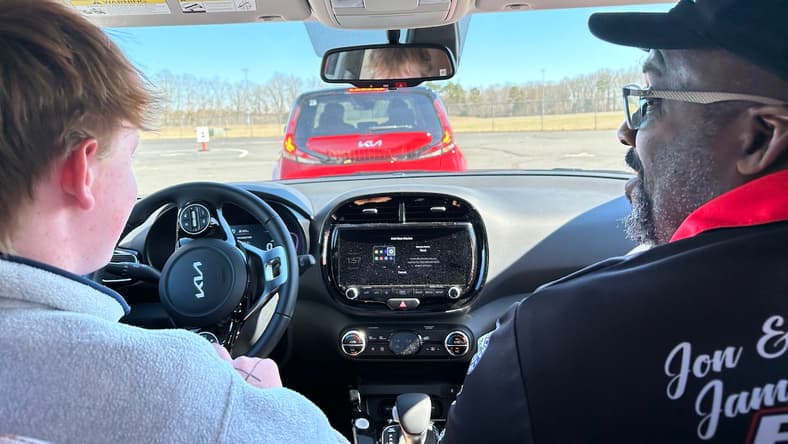 Student And Instructor In Kia Souls At B.r.a.k.e.s. Driving School