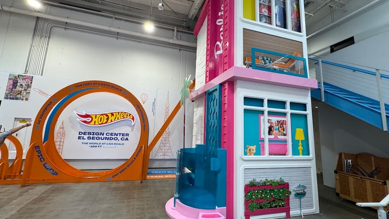 The Lobby In The Mattel Design Center Features A Super-Size Hot Wheels Track And An Elevator Bank Dressed Up As The Barbie Dream House
