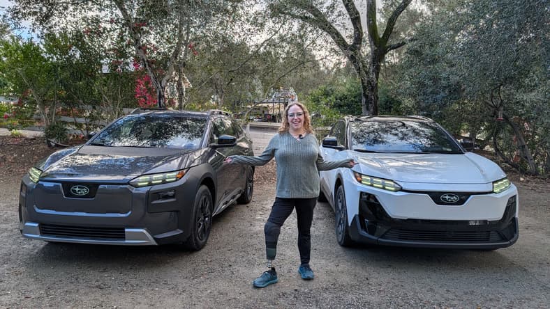 Liv Leigh Standing In Front Of The Subaru Uncharted And Subaru Trailseeker