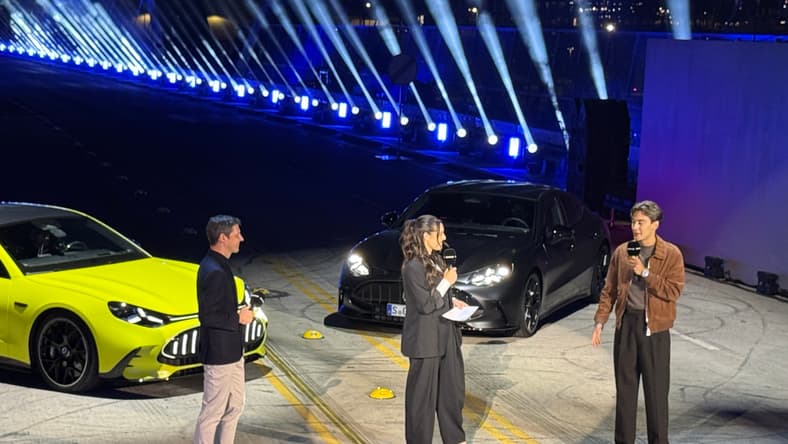 Michael Schiebe Of Amg And George Russell, F1 Driver, Introducing The Mercedes-Amg Gt 4-Door Coupe